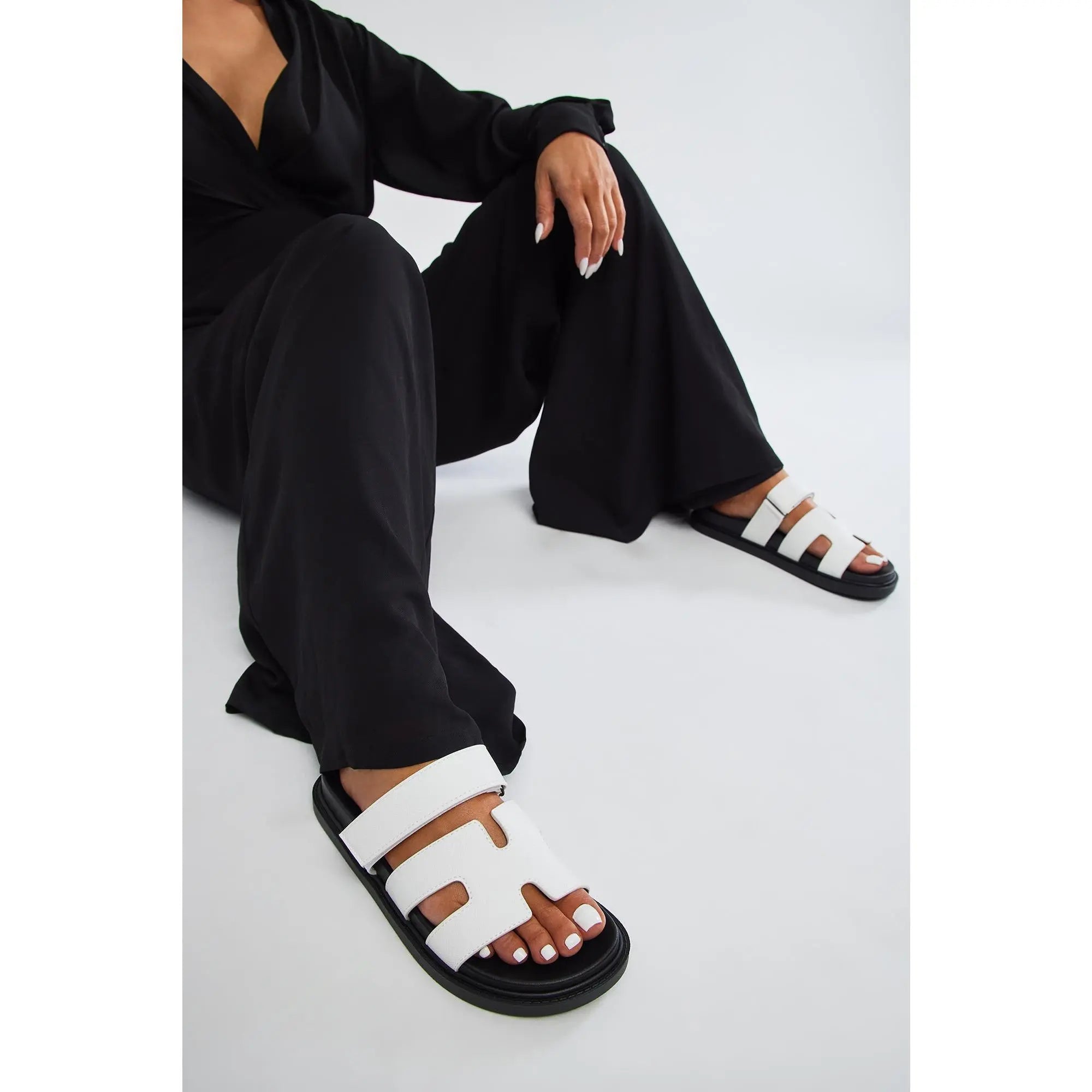Step Into Summer with the Stylish Agnes Flat Sandals in White
