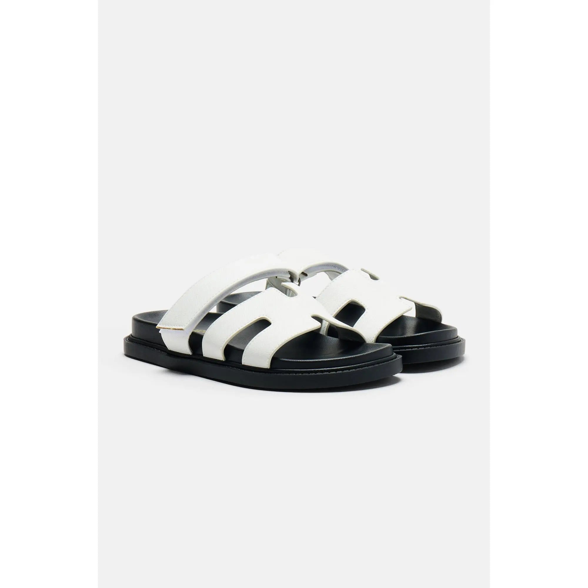 Step Into Summer with the Stylish Agnes Flat Sandals in White